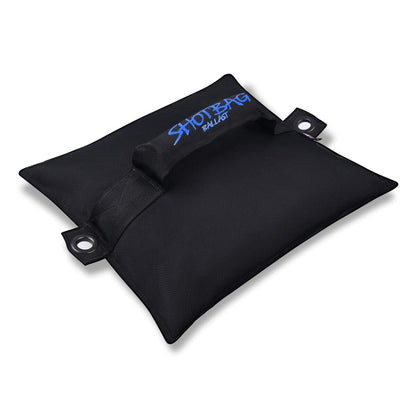 Angled view of a 50 lb Shotbag Ballast filled with steel shot, featuring a reinforced handle and side grommets for secure tie-down